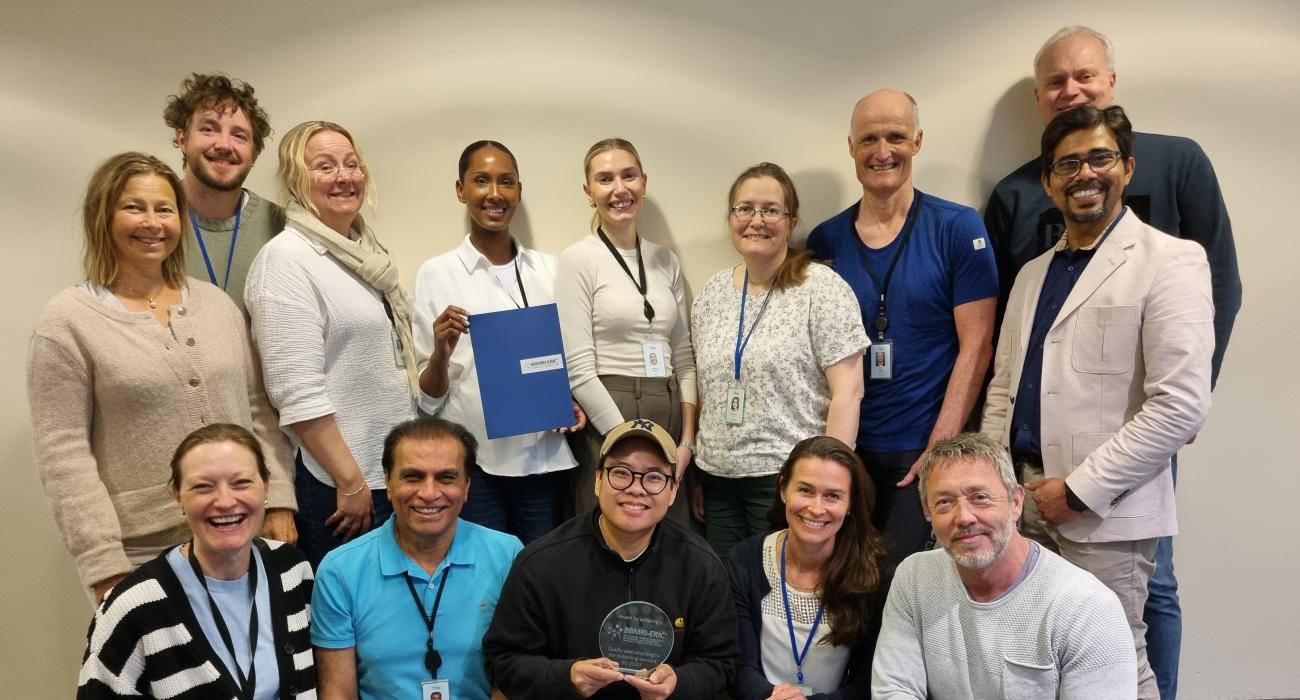 Staff at NIPH with diploma and distinction