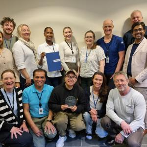 Staff at NIPH with diploma and distinction